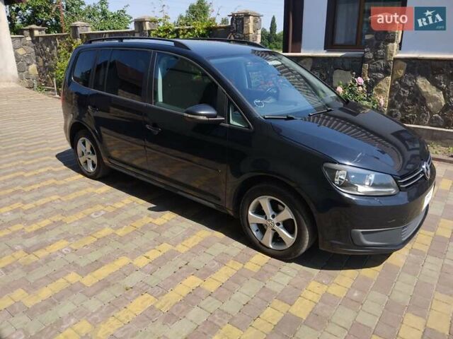 Чорний Фольксваген Туран, об'ємом двигуна 1.6 л та пробігом 227 тис. км за 10900 $, фото 1 на Automoto.ua