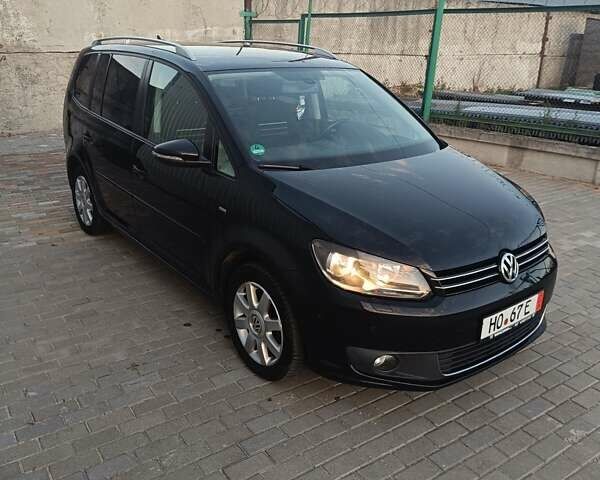 Черный Фольксваген Туран, объемом двигателя 1.6 л и пробегом 211 тыс. км за 12800 $, фото 11 на Automoto.ua