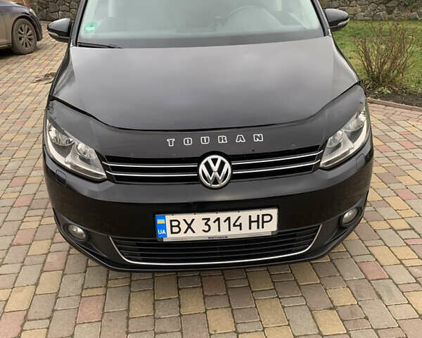 Черный Фольксваген Туран, объемом двигателя 1.97 л и пробегом 281 тыс. км за 13500 $, фото 2 на Automoto.ua