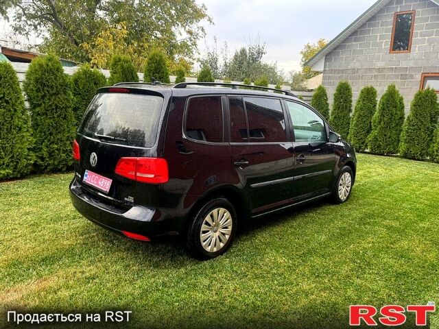 Черный Фольксваген Туран, объемом двигателя 1.6 л и пробегом 248 тыс. км за 9800 $, фото 1 на Automoto.ua