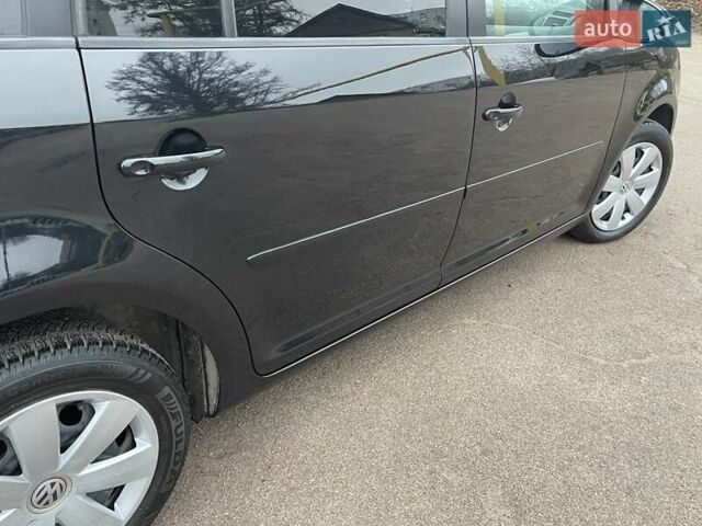 Черный Фольксваген Туран, объемом двигателя 1.4 л и пробегом 207 тыс. км за 10777 $, фото 100 на Automoto.ua