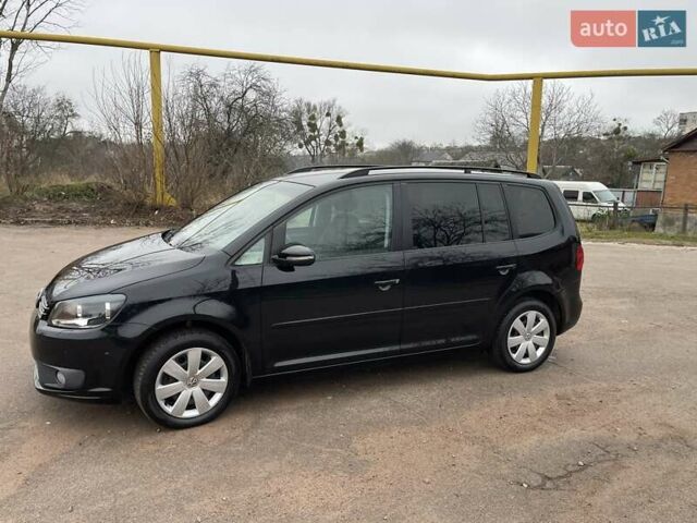 Черный Фольксваген Туран, объемом двигателя 1.4 л и пробегом 207 тыс. км за 10777 $, фото 111 на Automoto.ua