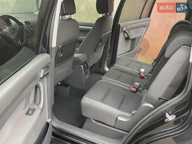 Черный Фольксваген Туран, объемом двигателя 1.4 л и пробегом 207 тыс. км за 10777 $, фото 130 на Automoto.ua