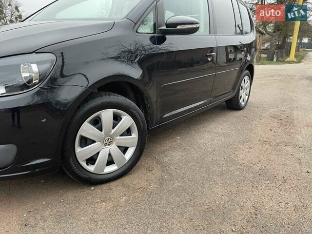 Черный Фольксваген Туран, объемом двигателя 1.4 л и пробегом 207 тыс. км за 10777 $, фото 108 на Automoto.ua