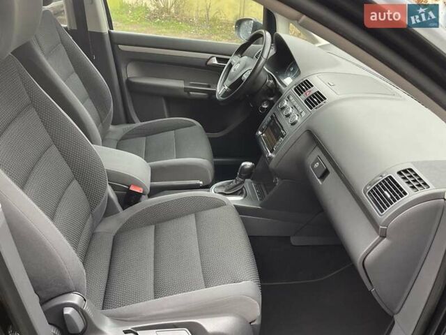 Черный Фольксваген Туран, объемом двигателя 1.4 л и пробегом 207 тыс. км за 10777 $, фото 211 на Automoto.ua