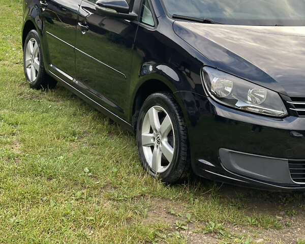 Чорний Фольксваген Туран, об'ємом двигуна 1.6 л та пробігом 253 тис. км за 12700 $, фото 4 на Automoto.ua