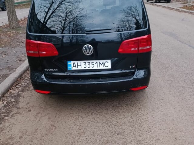 Черный Фольксваген Туран, объемом двигателя 1.6 л и пробегом 293 тыс. км за 10500 $, фото 1 на Automoto.ua