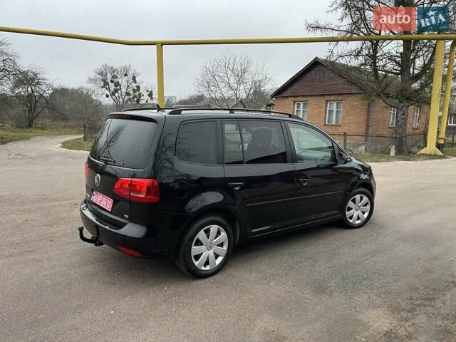 Черный Фольксваген Туран, объемом двигателя 1.4 л и пробегом 207 тыс. км за 10777 $, фото 184 на Automoto.ua