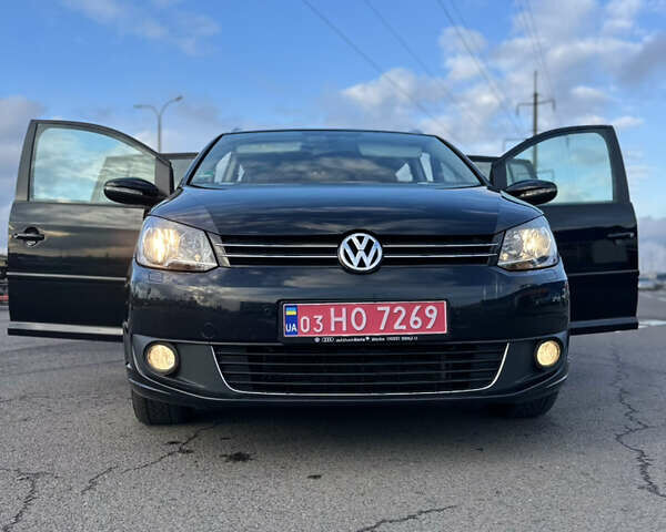 Черный Фольксваген Туран, объемом двигателя 1.97 л и пробегом 223 тыс. км за 13450 $, фото 1 на Automoto.ua