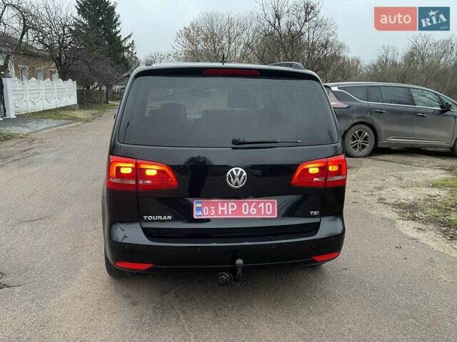 Черный Фольксваген Туран, объемом двигателя 1.4 л и пробегом 207 тыс. км за 10777 $, фото 4 на Automoto.ua