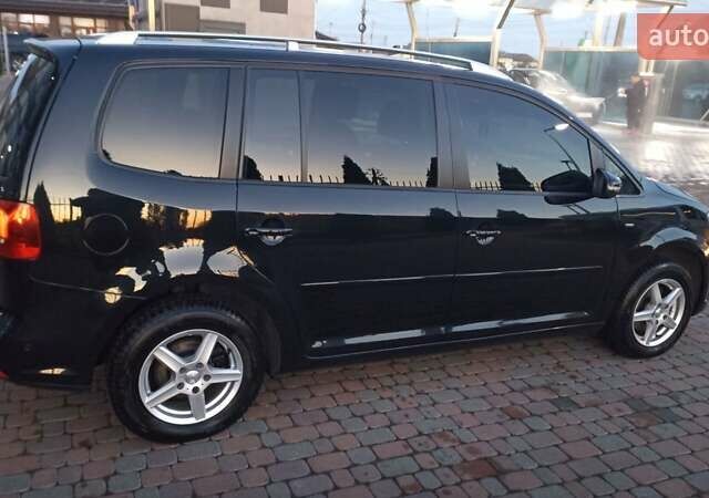 Черный Фольксваген Туран, объемом двигателя 1.6 л и пробегом 165 тыс. км за 13250 $, фото 53 на Automoto.ua