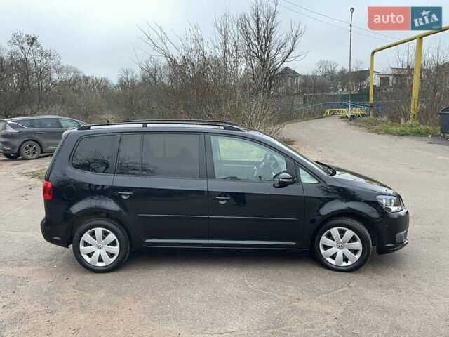 Черный Фольксваген Туран, объемом двигателя 1.4 л и пробегом 207 тыс. км за 10777 $, фото 95 на Automoto.ua