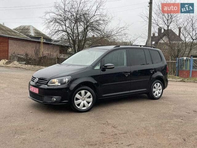 Черный Фольксваген Туран, объемом двигателя 1.4 л и пробегом 207 тыс. км за 10777 $, фото 9 на Automoto.ua