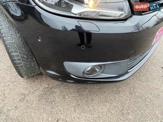 Черный Фольксваген Туран, объемом двигателя 1.4 л и пробегом 207 тыс. км за 10777 $, фото 15 на Automoto.ua