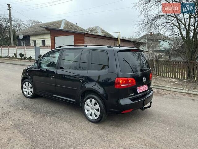 Черный Фольксваген Туран, объемом двигателя 1.4 л и пробегом 207 тыс. км за 10777 $, фото 176 на Automoto.ua