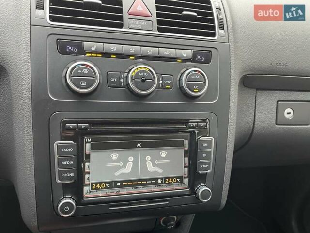 Черный Фольксваген Туран, объемом двигателя 1.4 л и пробегом 207 тыс. км за 10777 $, фото 69 на Automoto.ua