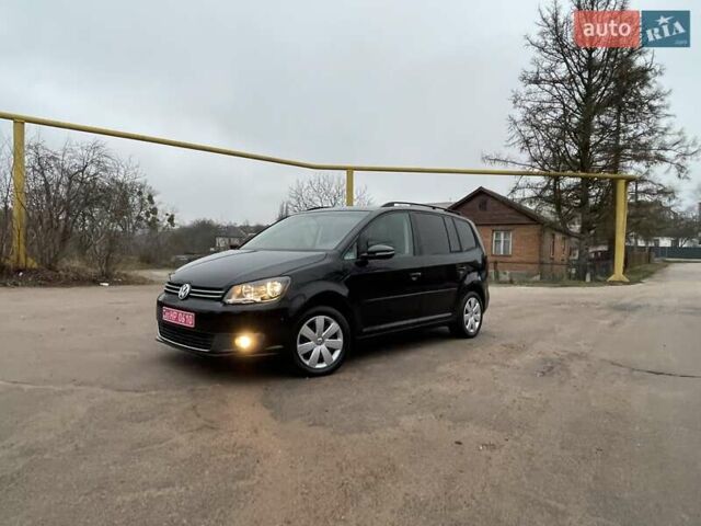 Черный Фольксваген Туран, объемом двигателя 1.4 л и пробегом 207 тыс. км за 10777 $, фото 103 на Automoto.ua