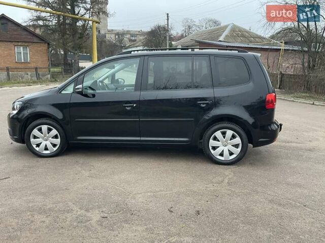 Черный Фольксваген Туран, объемом двигателя 1.4 л и пробегом 207 тыс. км за 10777 $, фото 19 на Automoto.ua