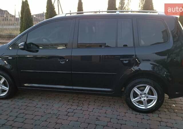 Черный Фольксваген Туран, объемом двигателя 1.6 л и пробегом 165 тыс. км за 13250 $, фото 24 на Automoto.ua