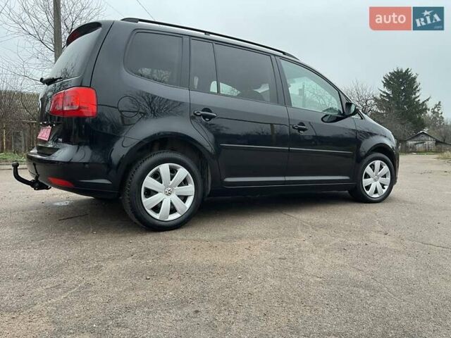 Черный Фольксваген Туран, объемом двигателя 1.4 л и пробегом 207 тыс. км за 10777 $, фото 170 на Automoto.ua