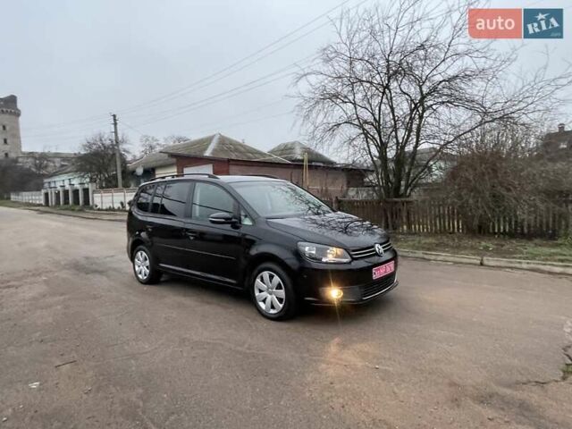 Черный Фольксваген Туран, объемом двигателя 1.4 л и пробегом 207 тыс. км за 10777 $, фото 188 на Automoto.ua