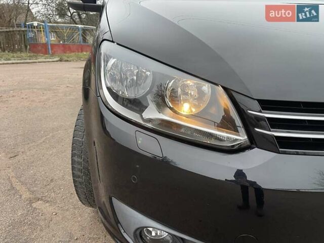 Черный Фольксваген Туран, объемом двигателя 1.4 л и пробегом 207 тыс. км за 10777 $, фото 12 на Automoto.ua