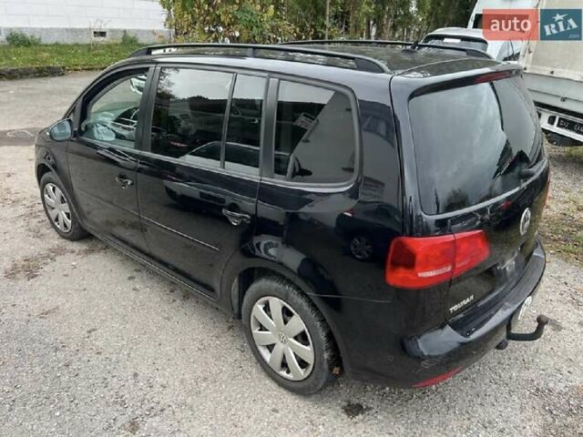 Черный Фольксваген Туран, объемом двигателя 1.4 л и пробегом 207 тыс. км за 10777 $, фото 225 на Automoto.ua