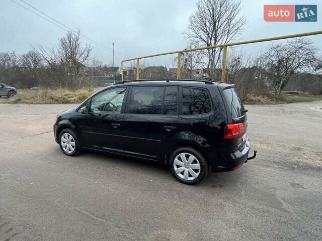 Черный Фольксваген Туран, объемом двигателя 1.4 л и пробегом 207 тыс. км за 10777 $, фото 193 на Automoto.ua