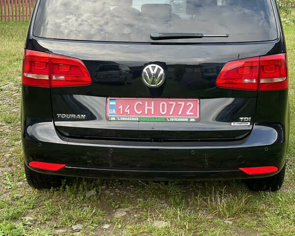 Чорний Фольксваген Туран, об'ємом двигуна 1.6 л та пробігом 253 тис. км за 12700 $, фото 6 на Automoto.ua