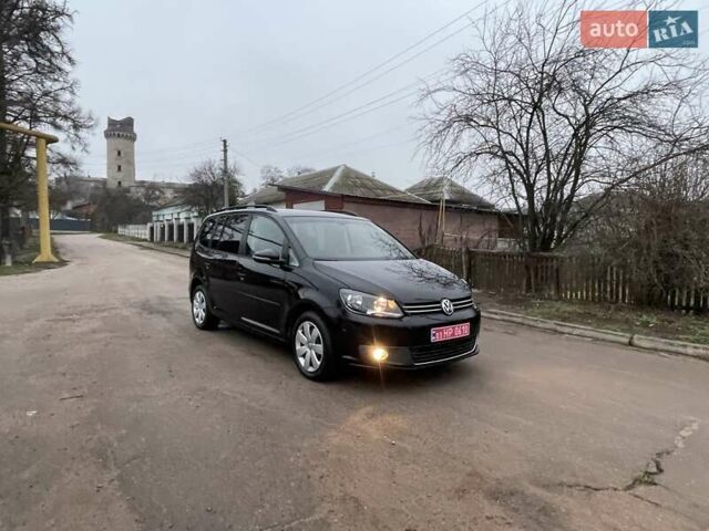 Черный Фольксваген Туран, объемом двигателя 1.4 л и пробегом 207 тыс. км за 10777 $, фото 187 на Automoto.ua