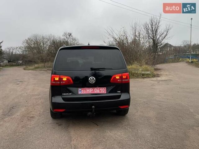 Черный Фольксваген Туран, объемом двигателя 1.4 л и пробегом 207 тыс. км за 10777 $, фото 113 на Automoto.ua