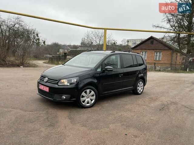 Черный Фольксваген Туран, объемом двигателя 1.4 л и пробегом 207 тыс. км за 10777 $, фото 107 на Automoto.ua