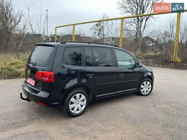 Черный Фольксваген Туран, объемом двигателя 1.4 л и пробегом 207 тыс. км за 10777 $, фото 97 на Automoto.ua