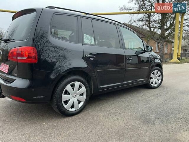 Черный Фольксваген Туран, объемом двигателя 1.4 л и пробегом 207 тыс. км за 10777 $, фото 185 на Automoto.ua
