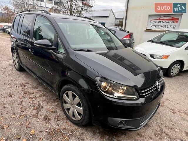 Черный Фольксваген Туран, объемом двигателя 1.4 л и пробегом 207 тыс. км за 10777 $, фото 222 на Automoto.ua