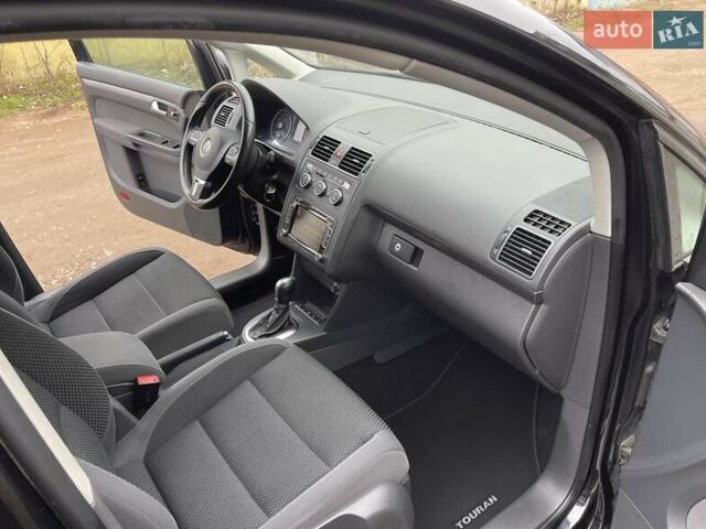 Черный Фольксваген Туран, объемом двигателя 1.4 л и пробегом 207 тыс. км за 10777 $, фото 203 на Automoto.ua