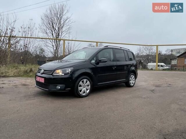 Черный Фольксваген Туран, объемом двигателя 1.4 л и пробегом 207 тыс. км за 10777 $, фото 6 на Automoto.ua