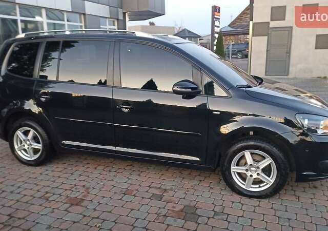 Черный Фольксваген Туран, объемом двигателя 1.6 л и пробегом 165 тыс. км за 13250 $, фото 4 на Automoto.ua