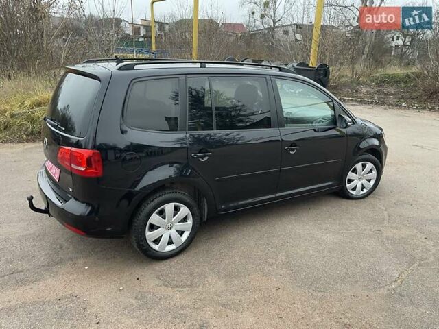 Черный Фольксваген Туран, объемом двигателя 1.4 л и пробегом 207 тыс. км за 10777 $, фото 101 на Automoto.ua