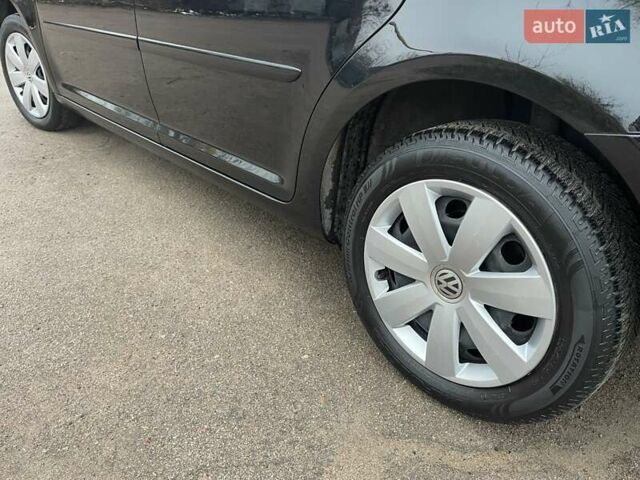 Черный Фольксваген Туран, объемом двигателя 1.4 л и пробегом 207 тыс. км за 10777 $, фото 31 на Automoto.ua