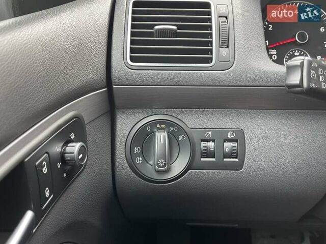 Черный Фольксваген Туран, объемом двигателя 1.4 л и пробегом 207 тыс. км за 10777 $, фото 76 на Automoto.ua