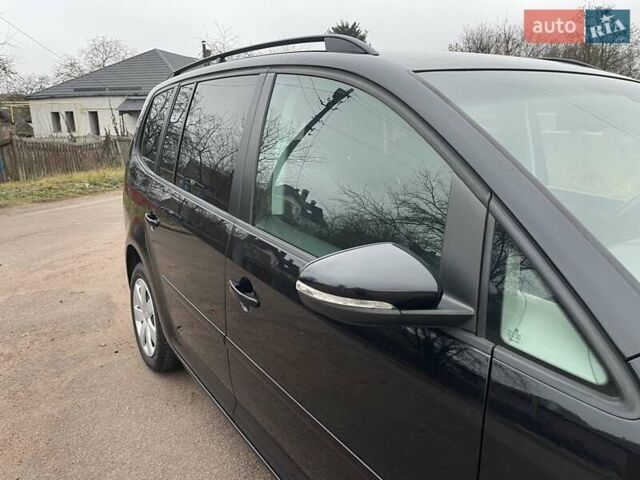 Черный Фольксваген Туран, объемом двигателя 1.4 л и пробегом 207 тыс. км за 10777 $, фото 92 на Automoto.ua