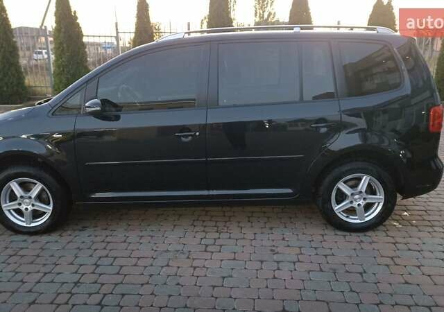 Черный Фольксваген Туран, объемом двигателя 1.6 л и пробегом 165 тыс. км за 13250 $, фото 39 на Automoto.ua