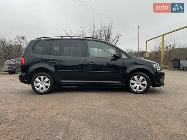 Черный Фольксваген Туран, объемом двигателя 1.4 л и пробегом 207 тыс. км за 10777 $, фото 96 на Automoto.ua