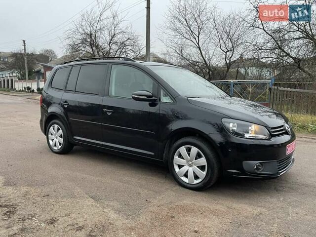 Черный Фольксваген Туран, объемом двигателя 1.4 л и пробегом 207 тыс. км за 10777 $, фото 2 на Automoto.ua