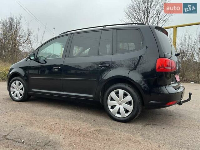 Черный Фольксваген Туран, объемом двигателя 1.4 л и пробегом 207 тыс. км за 10777 $, фото 112 на Automoto.ua