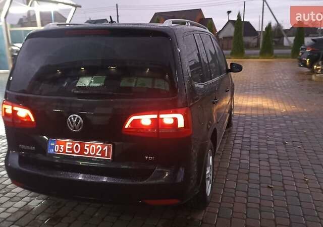 Черный Фольксваген Туран, объемом двигателя 1.6 л и пробегом 165 тыс. км за 13250 $, фото 91 на Automoto.ua