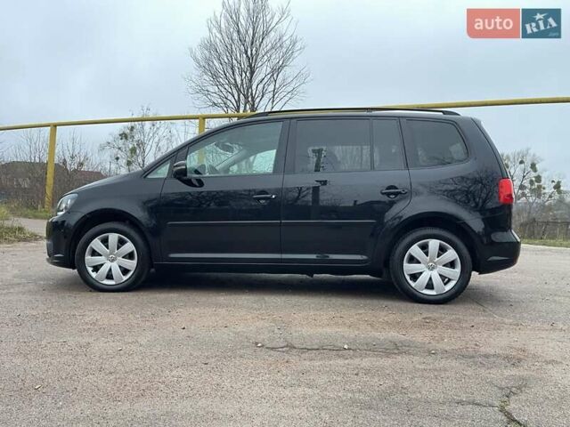 Черный Фольксваген Туран, объемом двигателя 1.4 л и пробегом 207 тыс. км за 10777 $, фото 110 на Automoto.ua