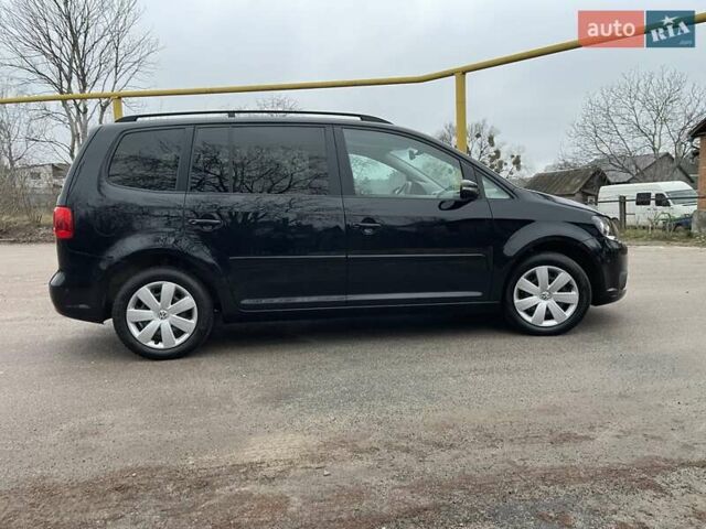 Черный Фольксваген Туран, объемом двигателя 1.4 л и пробегом 207 тыс. км за 10777 $, фото 182 на Automoto.ua