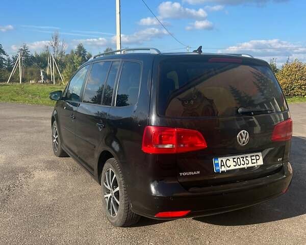 Черный Фольксваген Туран, объемом двигателя 1.6 л и пробегом 295 тыс. км за 12100 $, фото 5 на Automoto.ua